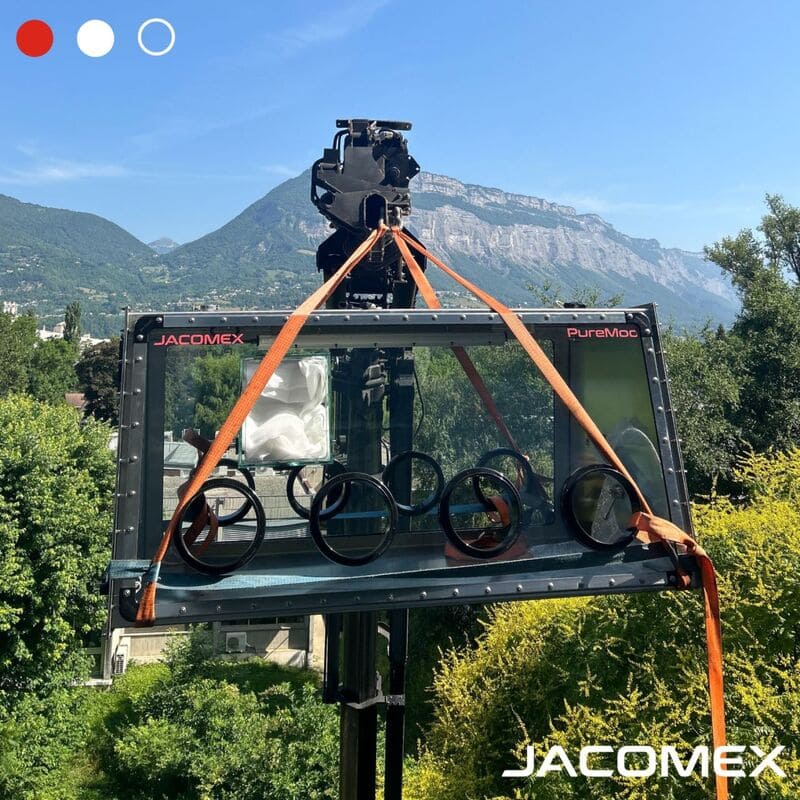 A glove box between sky and mountains
